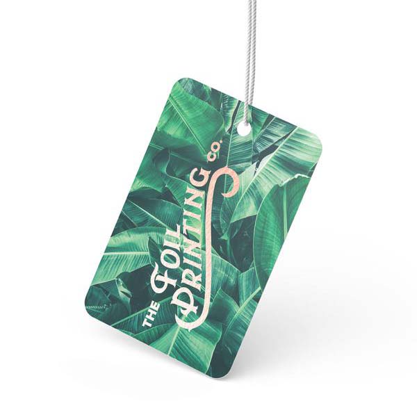 Metallic foil product tag with a botanical print background and metallic silver brand logo